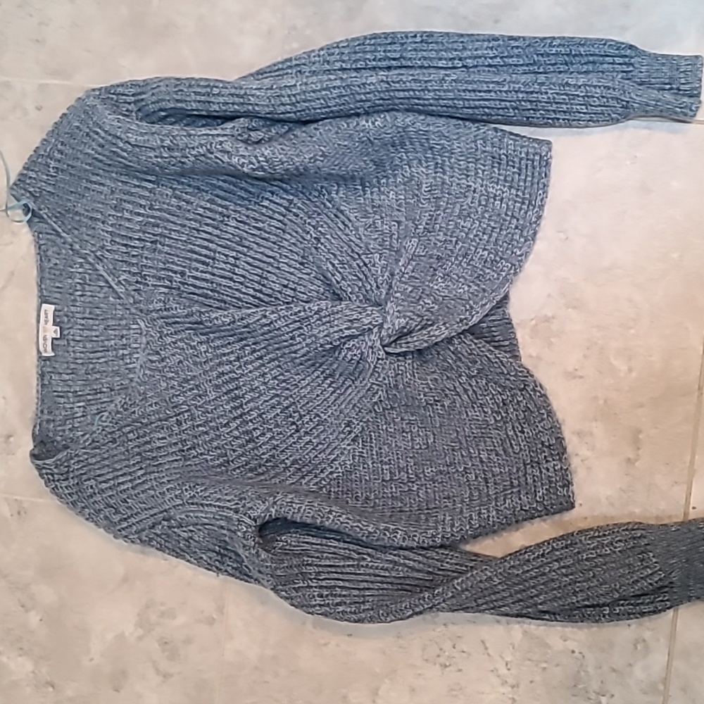 Blue sweater drone knot